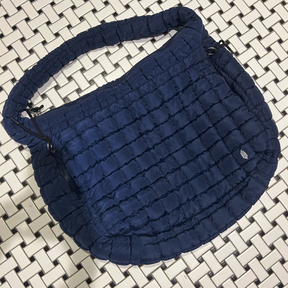 We The Free Oversized Puffer Sling Bag